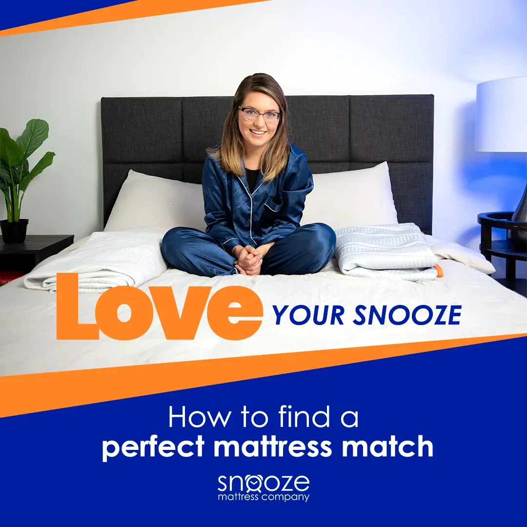 Woman with glasses sitting on white Snooze mattress